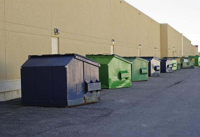 brightly colored dumpsters filled with construction waste in Edison